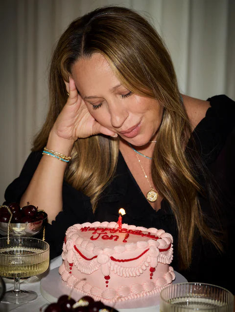 Jennifer Meyer with a birthday cake