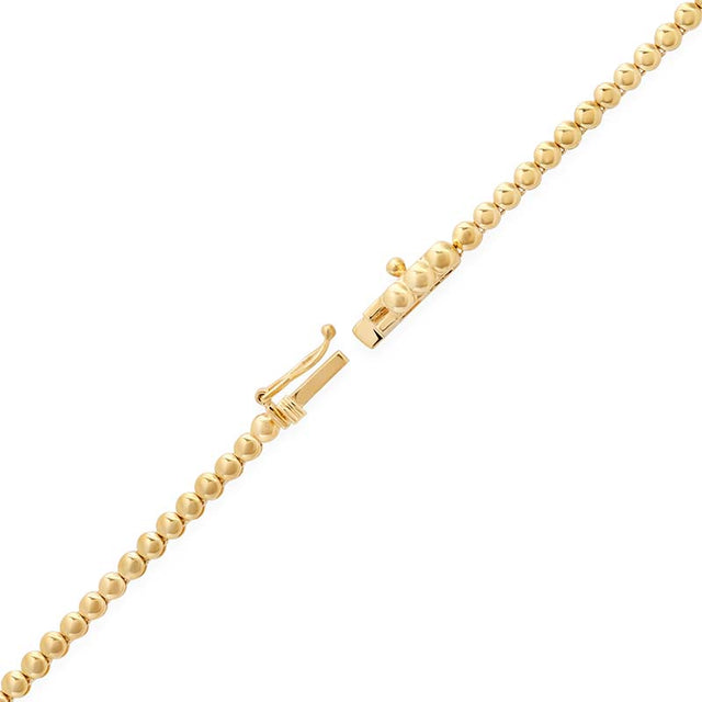 Bezel Tennis Necklace with Illusion Set Emerald Center