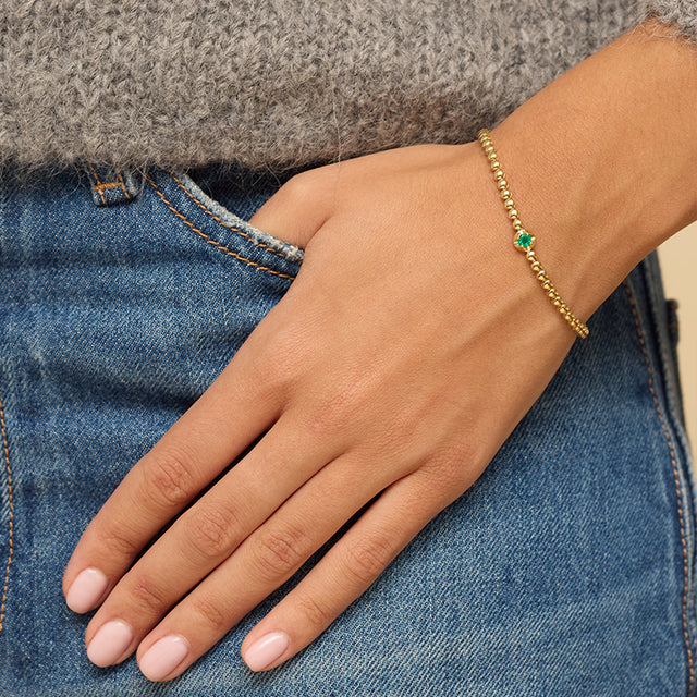 Bezel Tennis Bracelet With Illusion Set Emerald Center