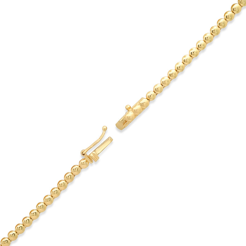 Mini Bezel Tennis Necklace with 1/3 Diamond and Emerald Bezel Accents